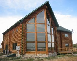 Log Home with nice big windows!